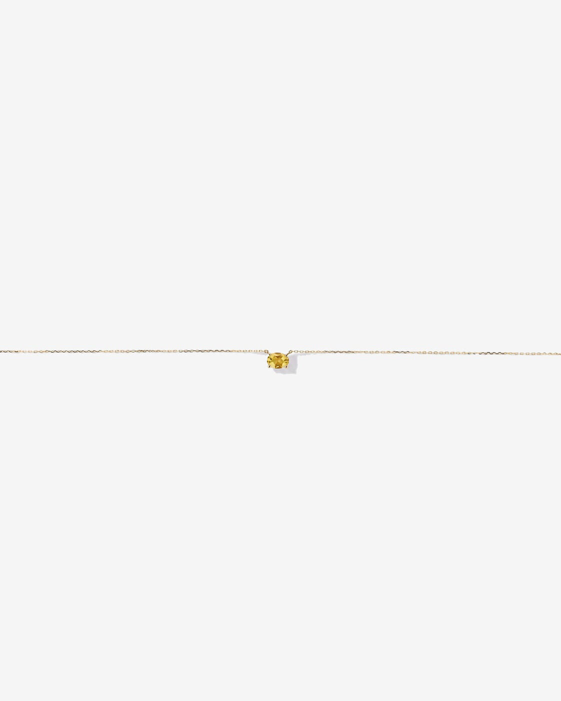 Collier en citrine ovale (montage horizontal) et or jaune 10 carats