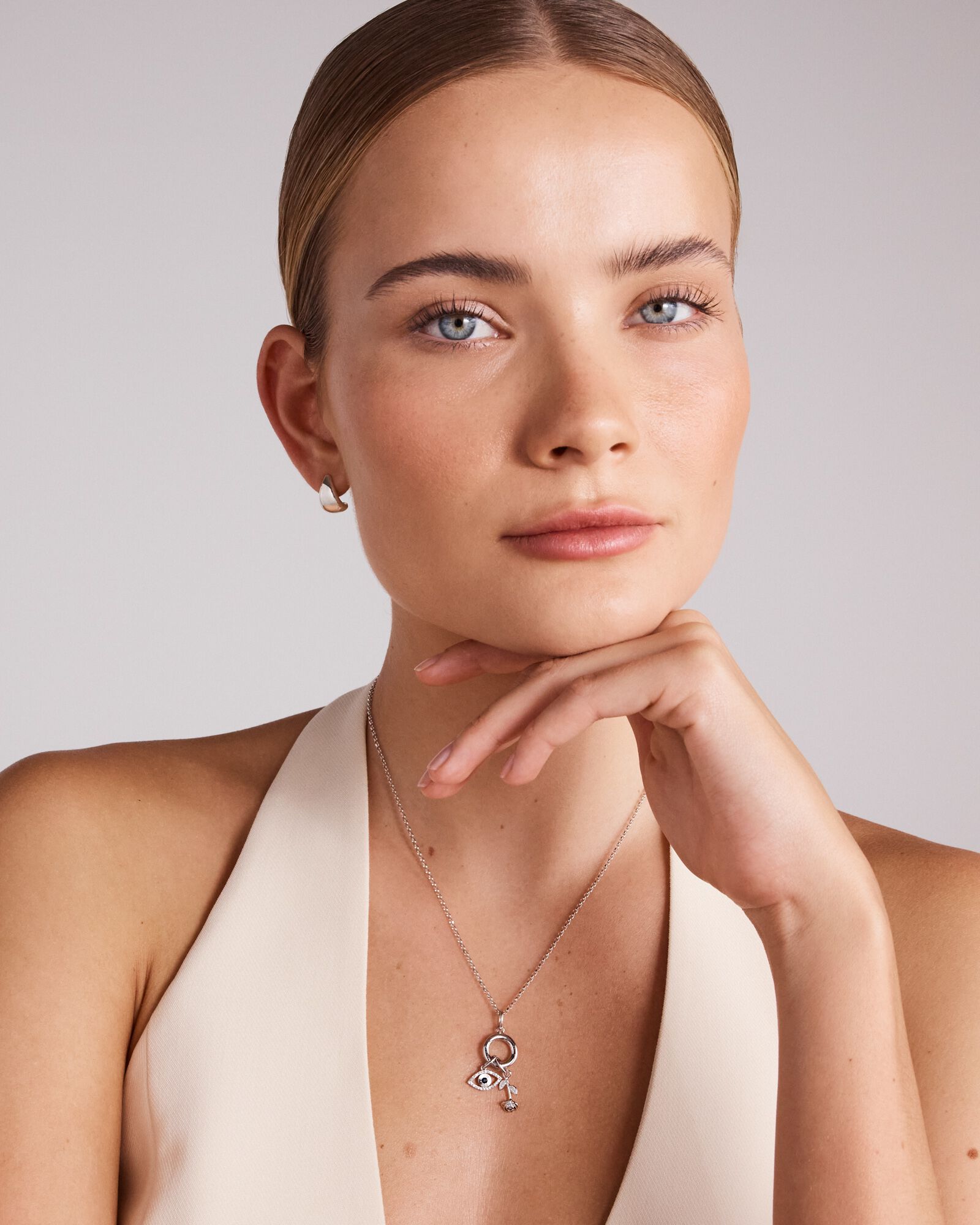 Diamond and Sapphire Evil Eye Pendant in 10kt White Gold