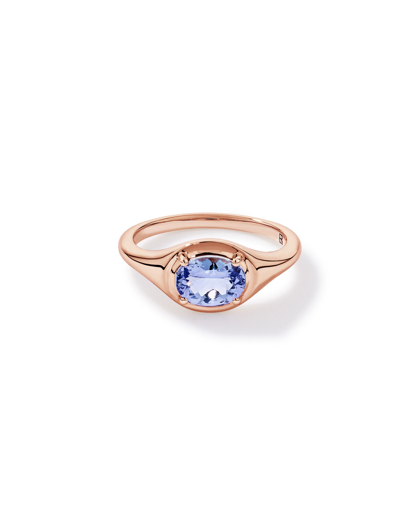 Anneau ovale taill&eacute; en tanzanite est-ouest en or rose 10 carats
