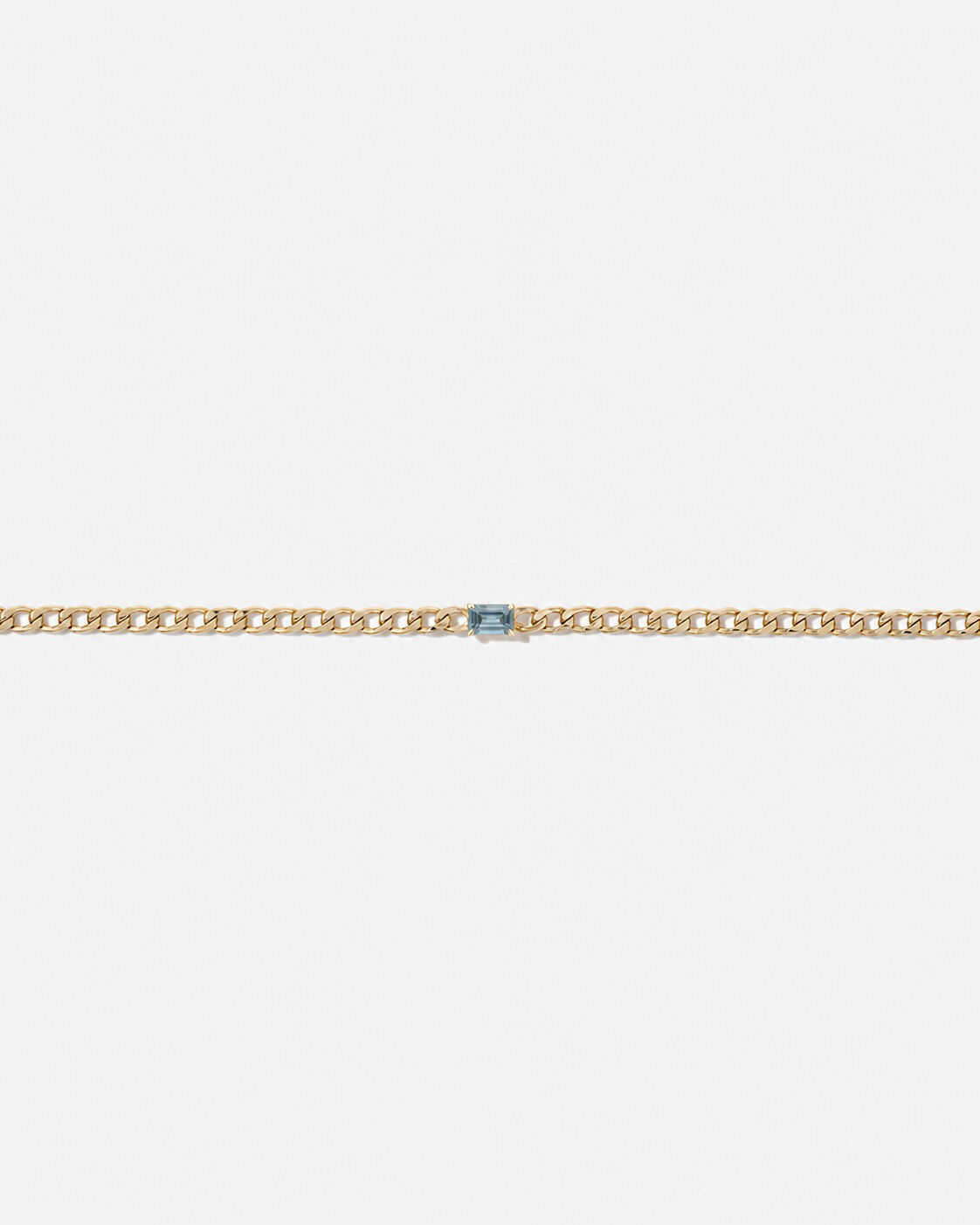Bracelet gourmette Topaze bleue en or jaune 10 ct