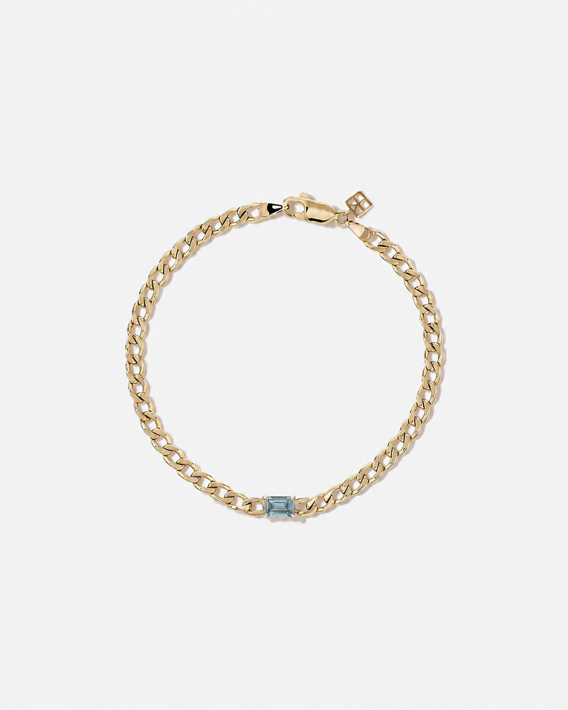 Bracelet gourmette Topaze bleue en or jaune 10 ct