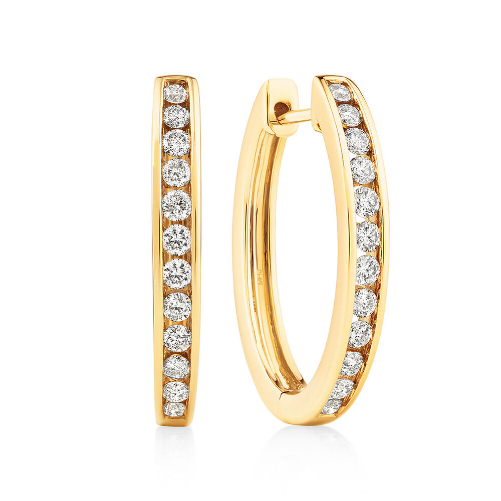 Huggie Earrings with 0.50 Carat TW of Diamonds in 10kt Yellow Gold