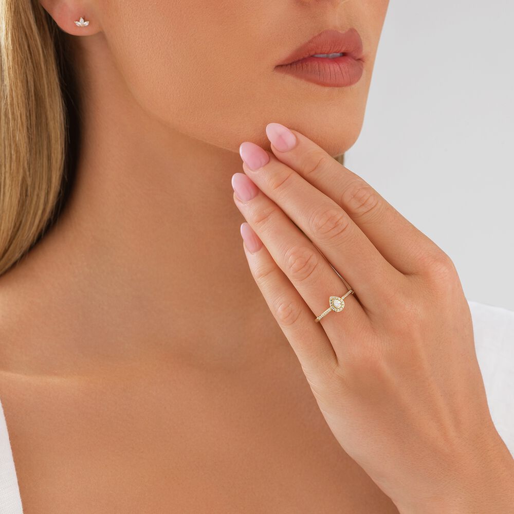 Pear Halo Engagement Ring with 0.20TW of Diamonds in 10k Yellow Gold