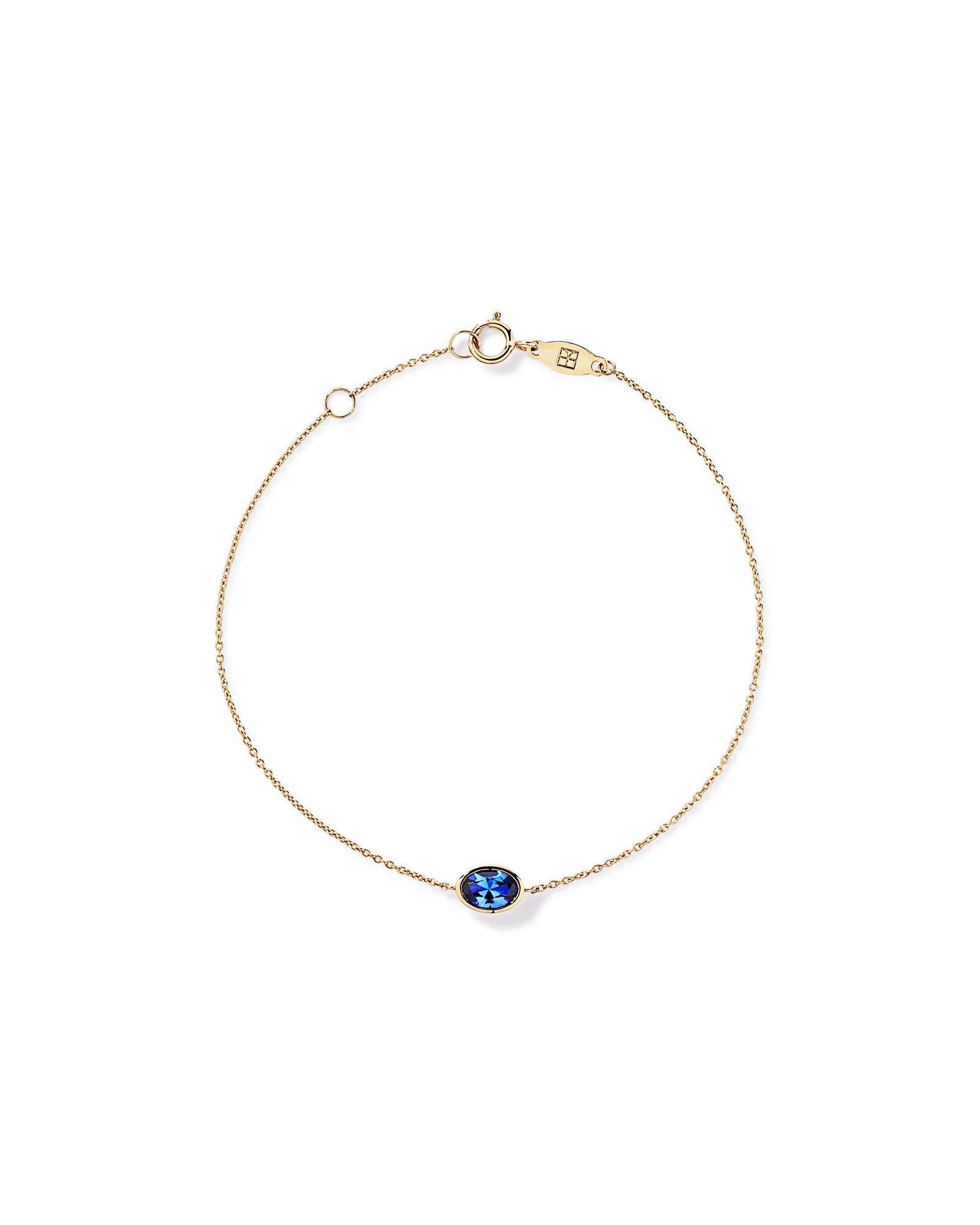 A cr&eacute;&eacute; un bracelet saphir bleu en or jaune 10 carats