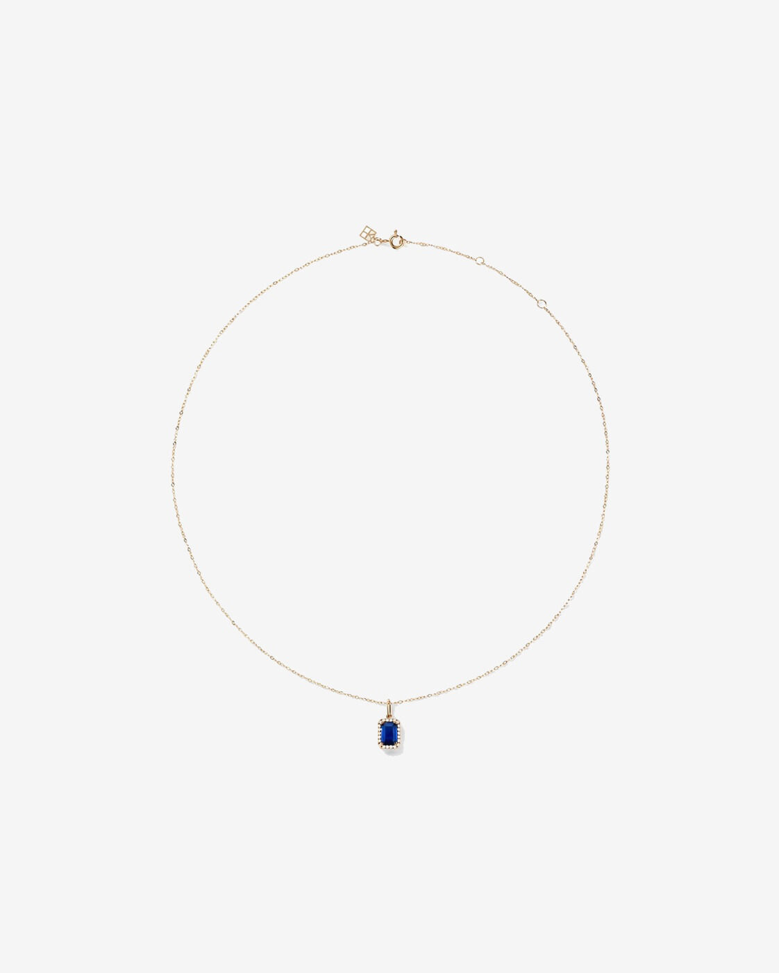 Pendentif halo Saphir cr&eacute;&eacute; taille &eacute;meraude avec diamants et cha&icirc;ne en or jaune 10 ct