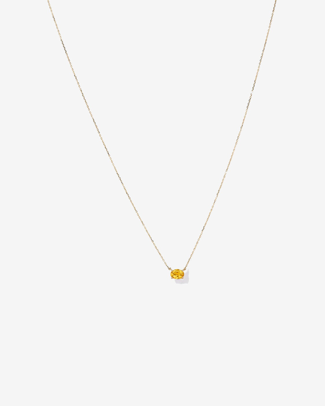 Collier en citrine ovale (montage horizontal) et or jaune 10 carats