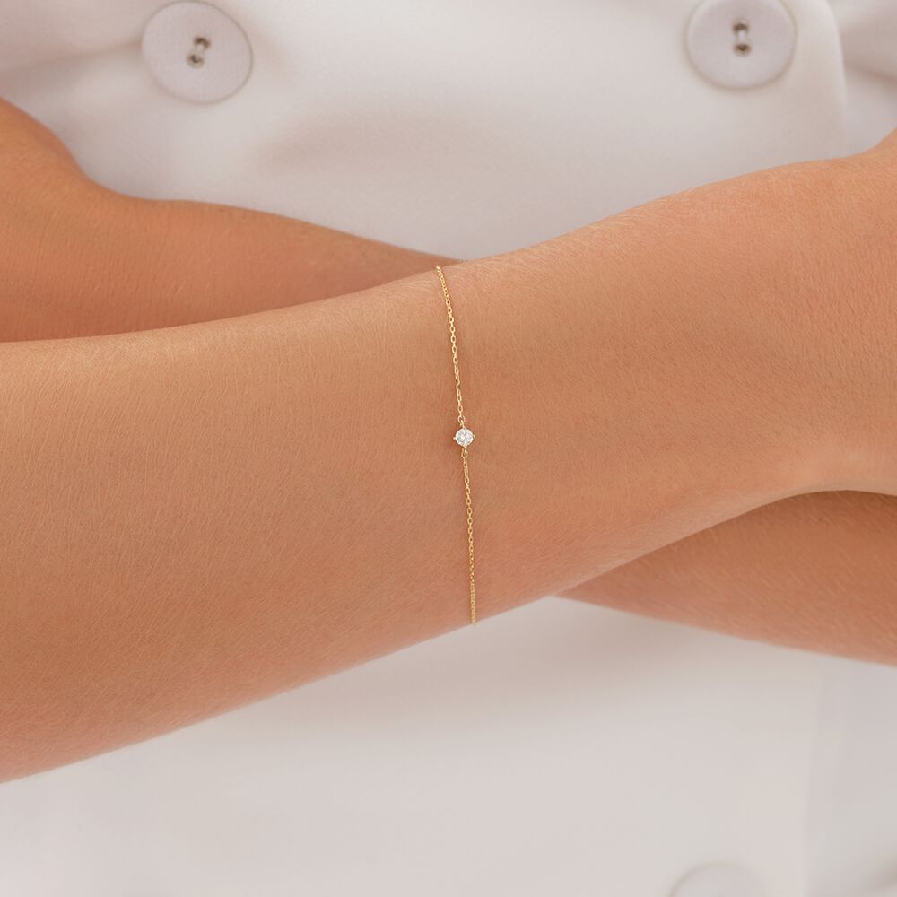 Bracelet with .08 Carat TW Diamond Birthstone in 10kt Yellow Gold