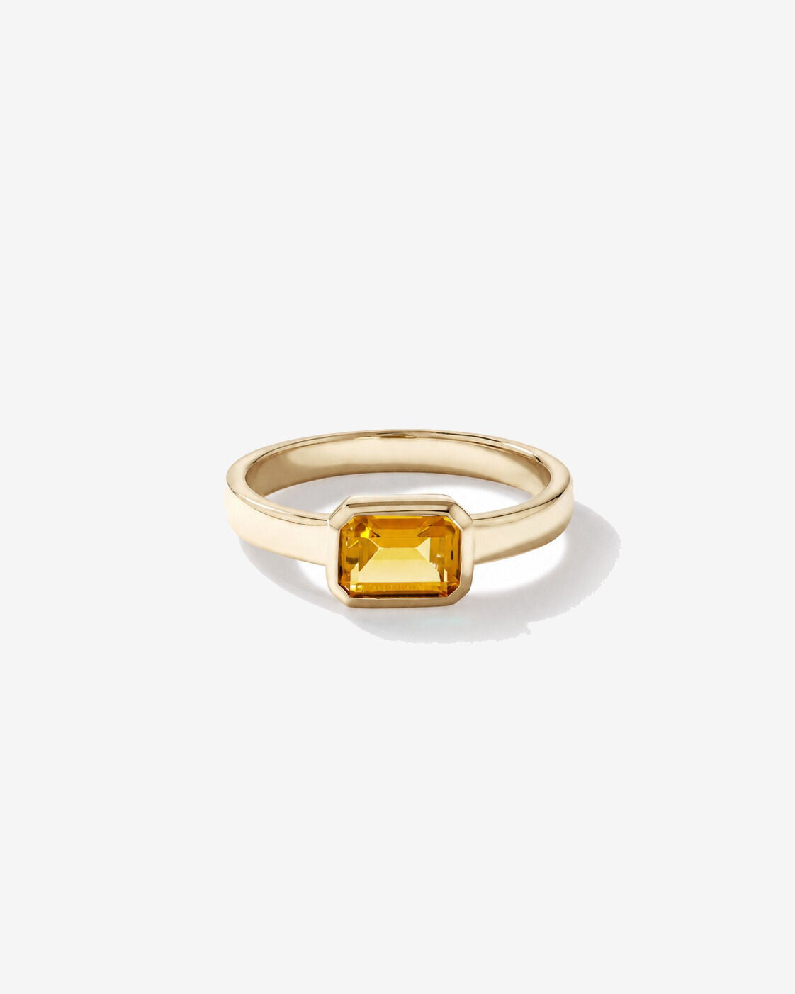Bague en or jaune 10 carats avec citrine sertie clos