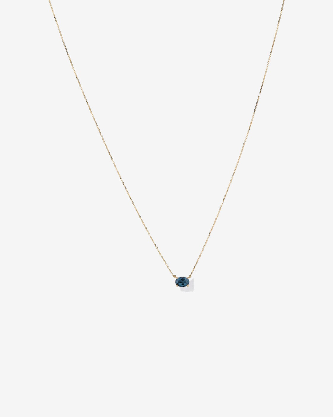 Collier ovale est-ouest Topaze bleu London en or jaune 10 ct