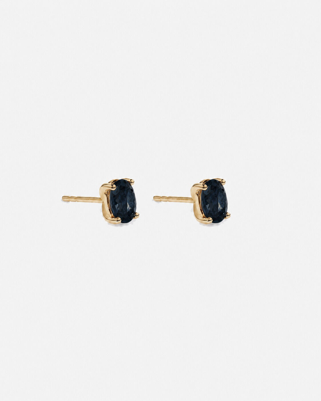 Boucles d'oreilles puces ovales Topaze bleu London en or jaune 10 ct