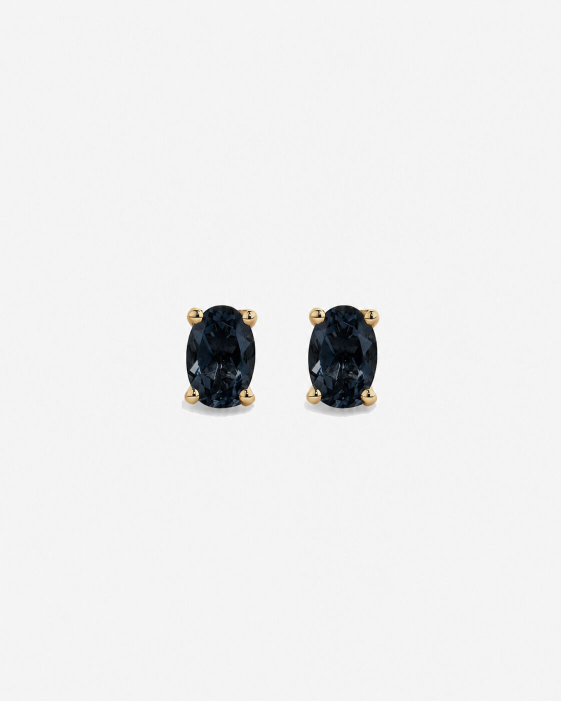 Boucles d'oreilles puces ovales Topaze bleu London en or jaune 10 ct